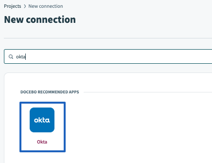 The search bar and Okta connector in the search result